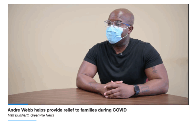 man in black shirt wearing covid mask