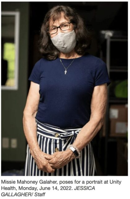 woman in glasses wearing a mask 