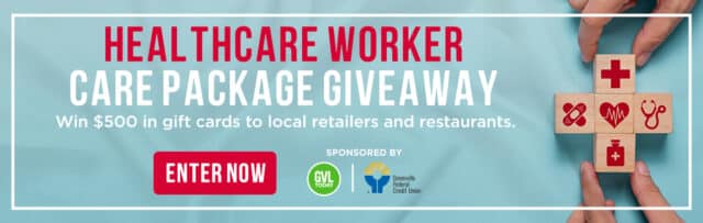 healthcare worker care package give away with blue fabric background and blocks with medical symbols