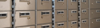 Lockboxes in a row, showcasing secure payment processing solutions for streamlined receivables management.